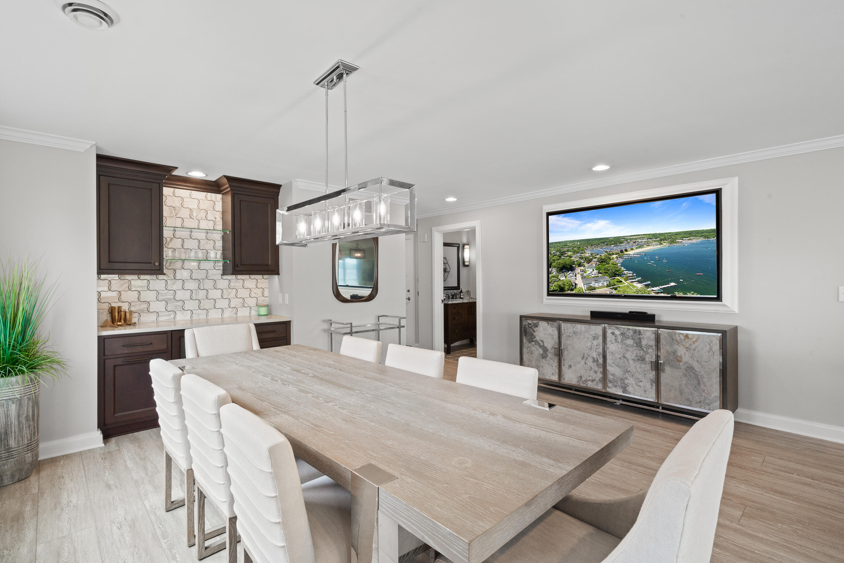 432 Harvard Avenue, Unit 5E 6F Fontana, WI 53125 - Photo 10 of 28 Custom built bar in the Dining