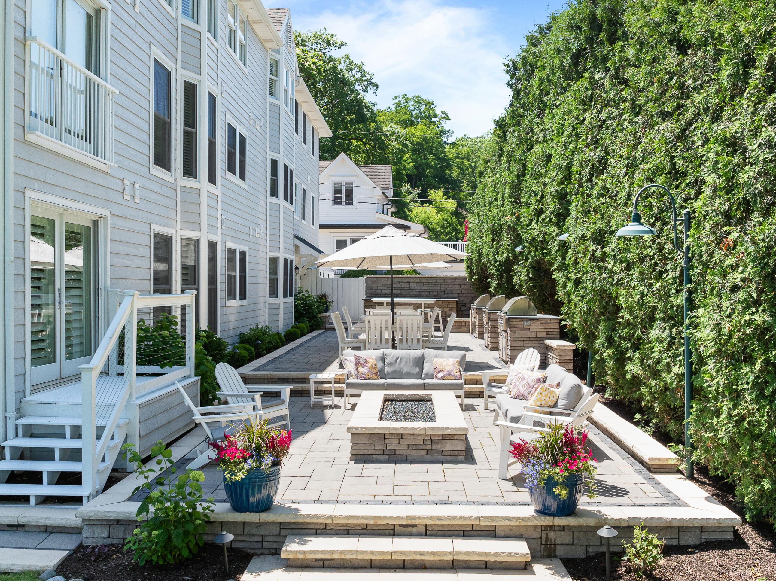 432 Harvard Avenue, Unit 5E 6F Fontana, WI 53125 - Photo 5 of 28 Plenty of common areas for bbq and cozy lakeside fires