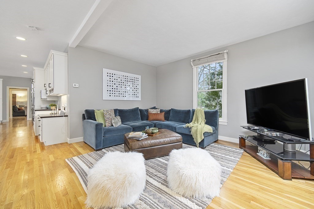 90 Ruddock Road Sudbury, MA 01776 - Photo 11 of 41 a living room with furniture and a flat screen tv