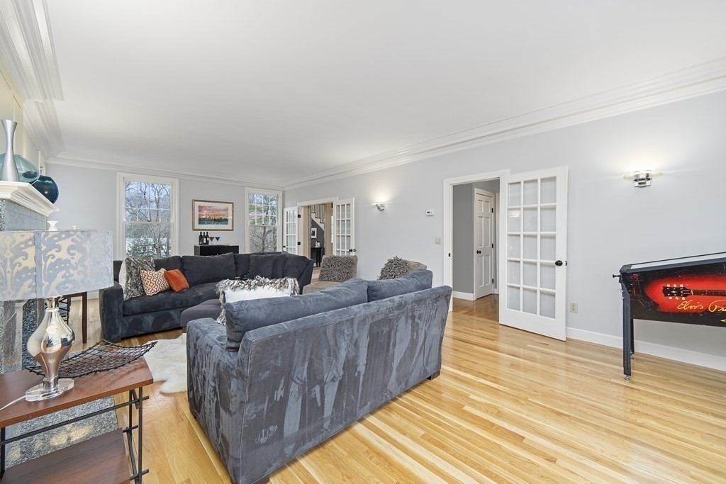 90 Ruddock Road Sudbury, MA 01776 - Photo 15 of 41 a living room with furniture and a wooden floor