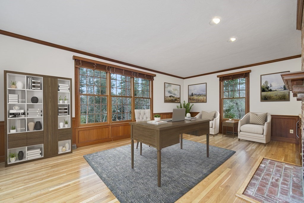 90 Ruddock Road Sudbury, MA 01776 - Photo 18 of 41 a living room with furniture large windows and wooden floor