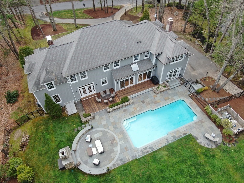 90 Ruddock Road Sudbury, MA 01776 - Photo 2 of 41 an aerial view of a house with a garden