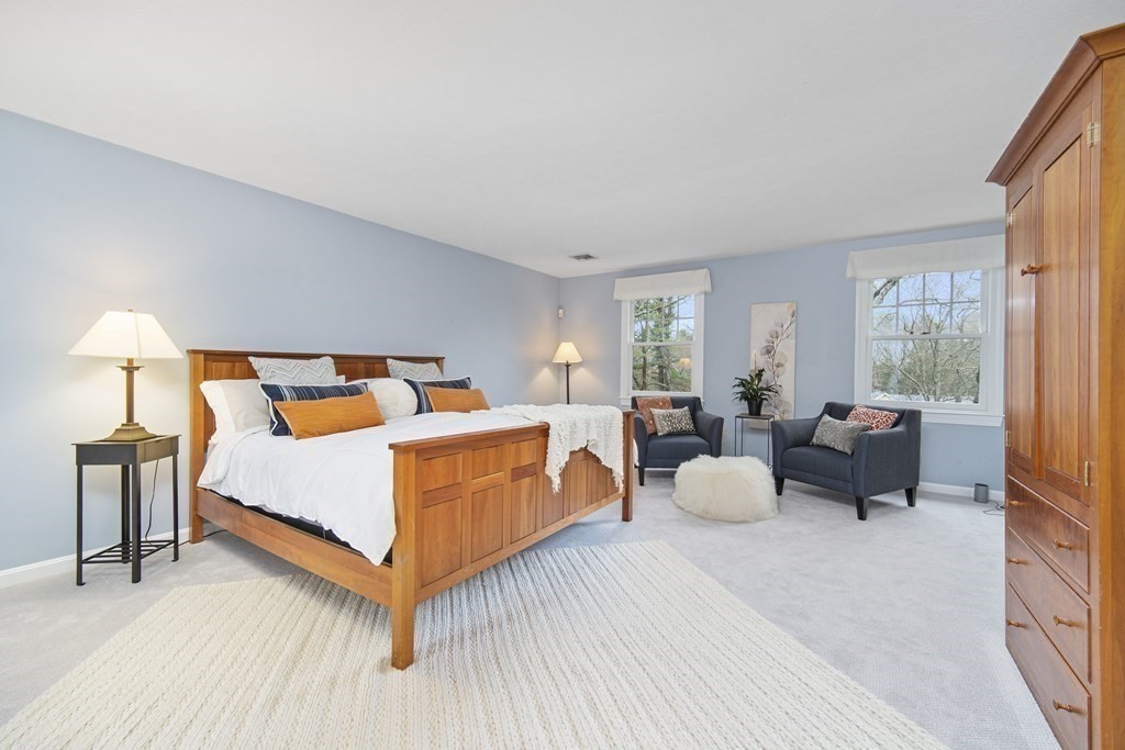 90 Ruddock Road Sudbury, MA 01776 - Photo 21 of 41 a bedroom with furniture and a large window