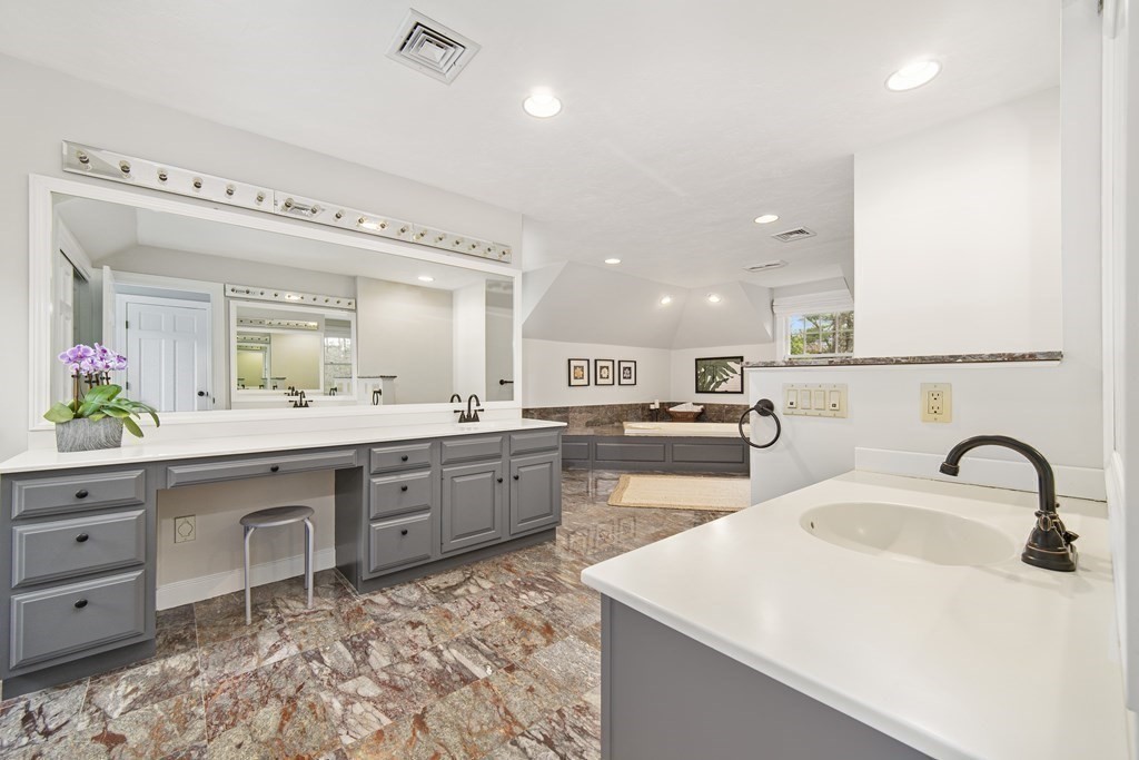90 Ruddock Road Sudbury, MA 01776 - Photo 23 of 41 a large white kitchen with a sink and cabinets