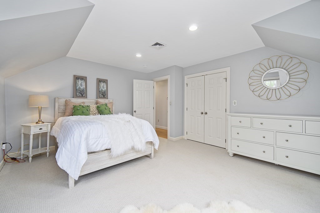 90 Ruddock Road Sudbury, MA 01776 - Photo 28 of 41 a bedroom with a bed and a closet