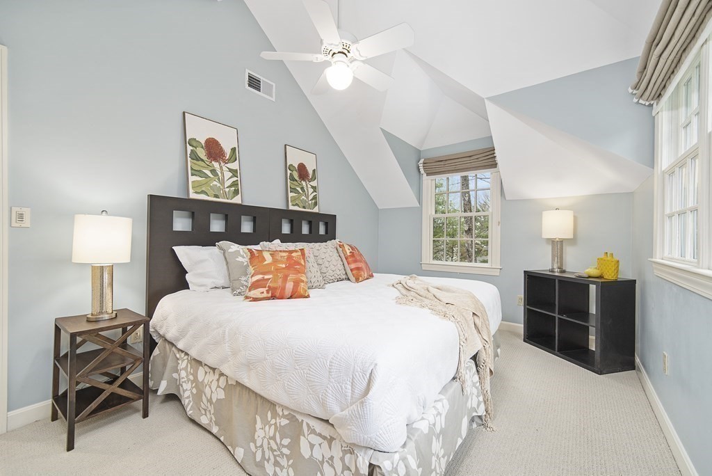 90 Ruddock Road Sudbury, MA 01776 - Photo 29 of 41 a bedroom with a bed and a table