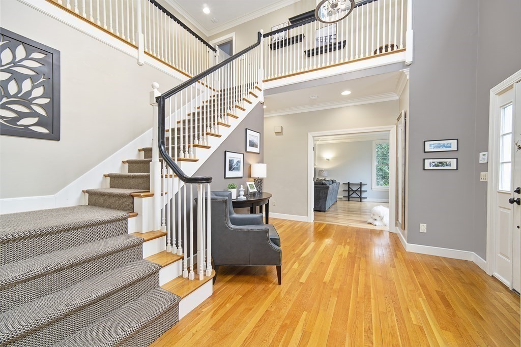 90 Ruddock Road Sudbury, MA 01776 - Photo 3 of 41 a view of a living room and wooden floor