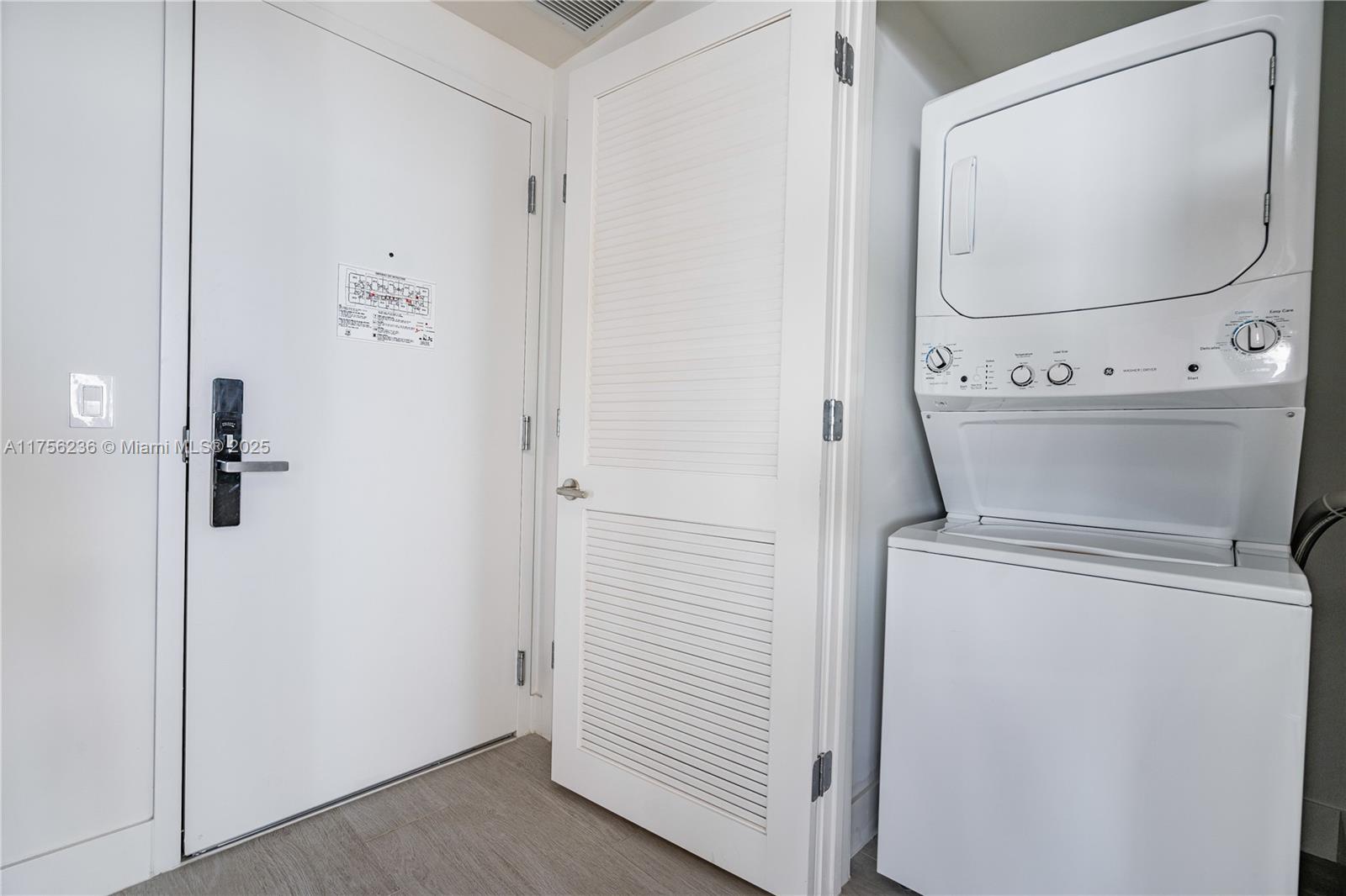 4010 South Ocean Drive, Unit R1609 Hollywood, FL 33019 - Photo 24 of 50 a utility room with dryer and washer