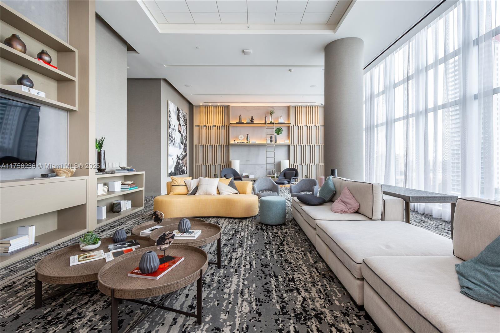 4010 South Ocean Drive, Unit R1609 Hollywood, FL 33019 - Photo 41 of 50 a living room with furniture and a fireplace