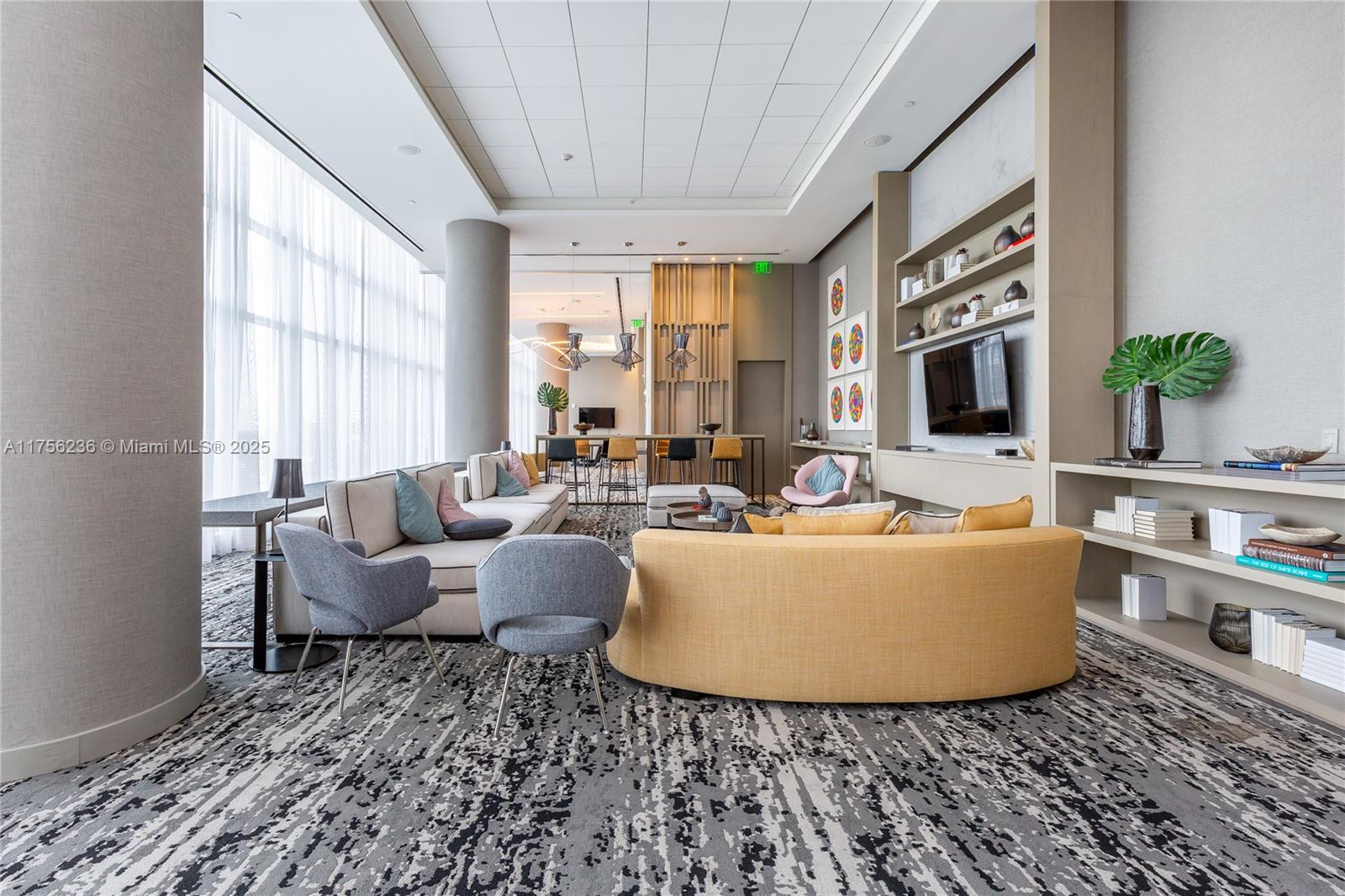 4010 South Ocean Drive, Unit R1609 Hollywood, FL 33019 - Photo 48 of 50 a living room with furniture and a flat screen tv