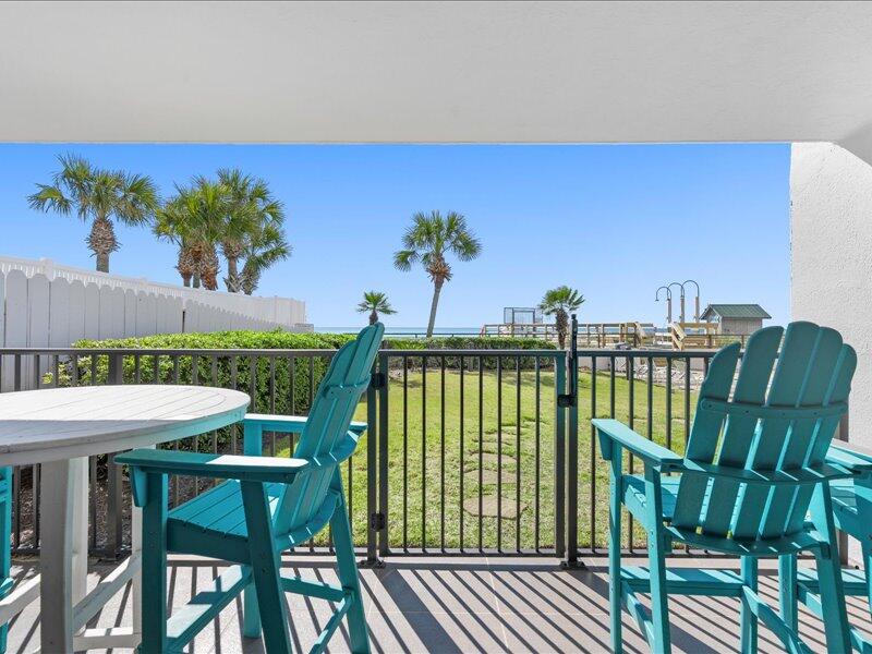 1044 Highway 98, Unit 101 Destin, FL 32541 - Photo 22 of 29 a view of a balcony with furniture