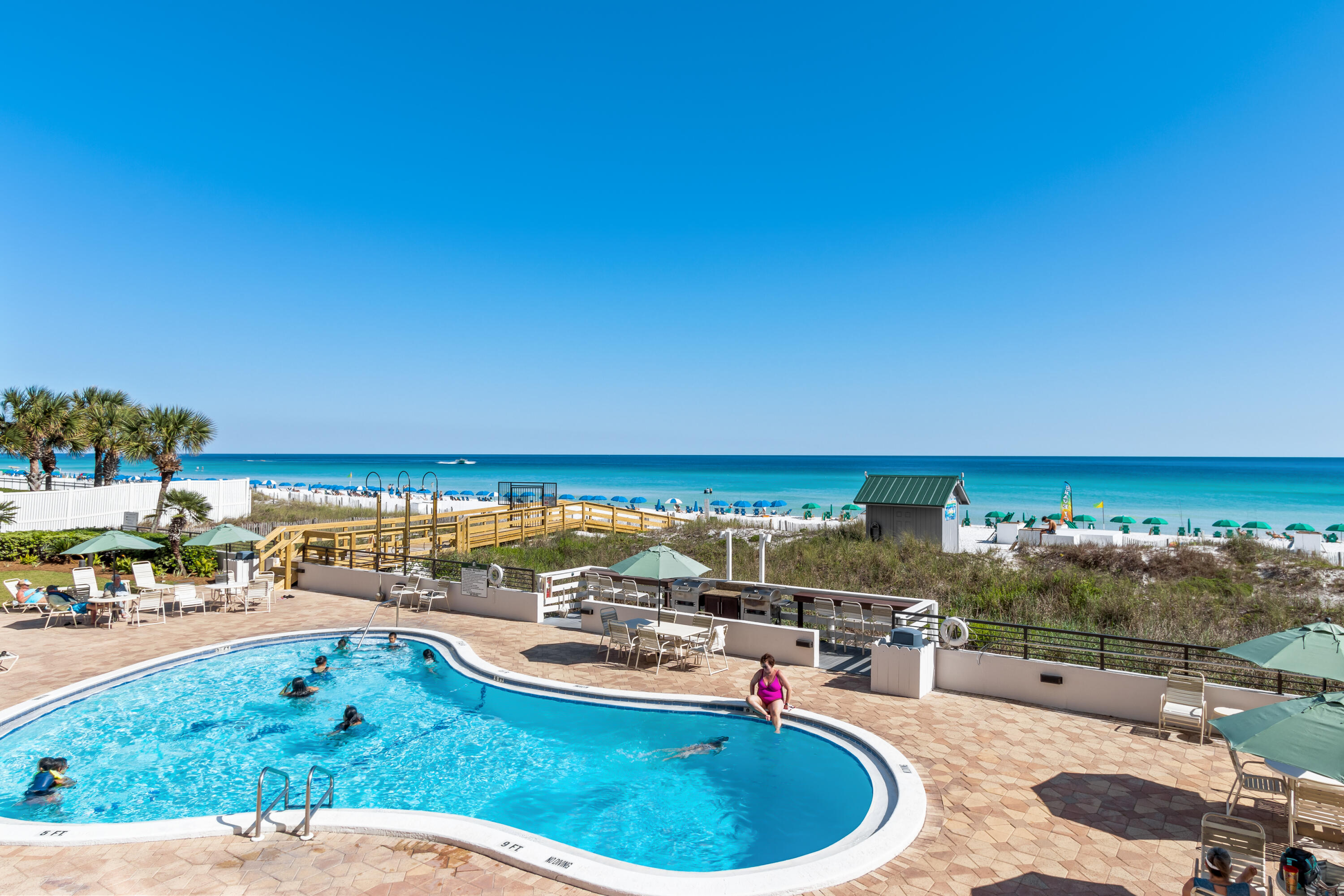 1044 Highway 98, Unit 101 Destin, FL 32541 - Photo 26 of 29 a view of a swimming pool with an outdoor seating