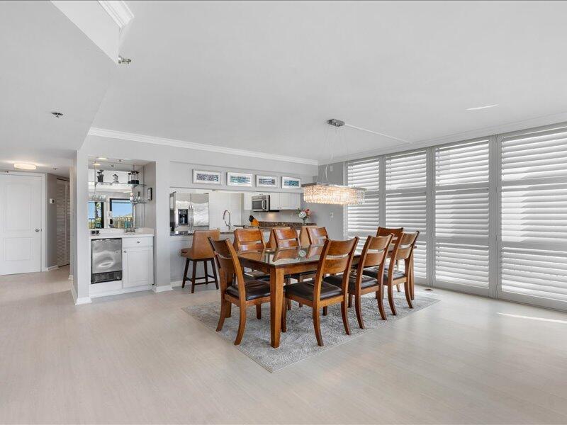 1044 Highway 98, Unit 101 Destin, FL 32541 - Photo 3 of 29 a dining room with furniture and window