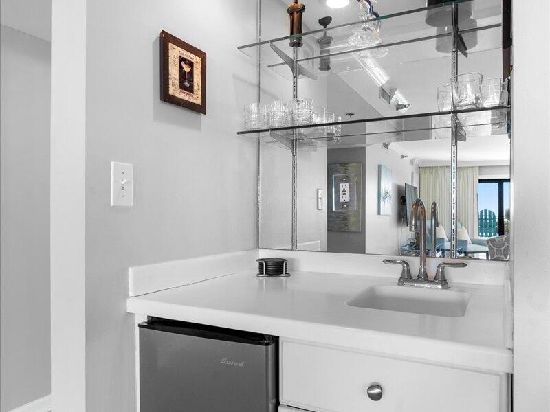 1044 Highway 98, Unit 101 Destin, FL 32541 - Photo 5 of 29 a bathroom with a sink and a mirror