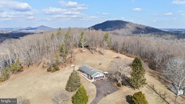 a view of a backyard of a house