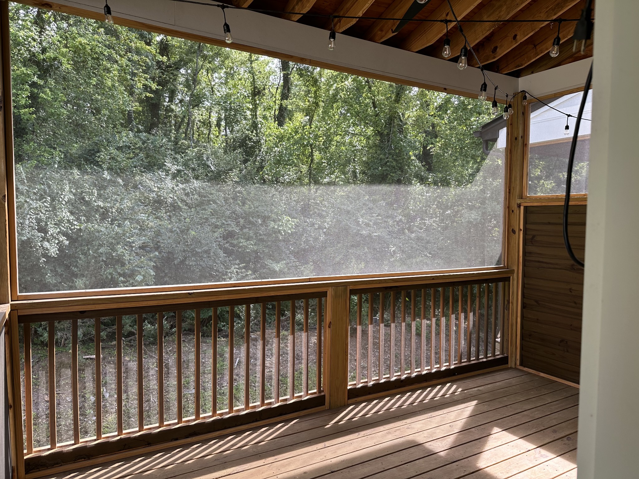 217 Stonecrest Drive, Unit 217 Nashville, TN 37209 - Photo 20 of 20 a view of a balcony with wooden floor