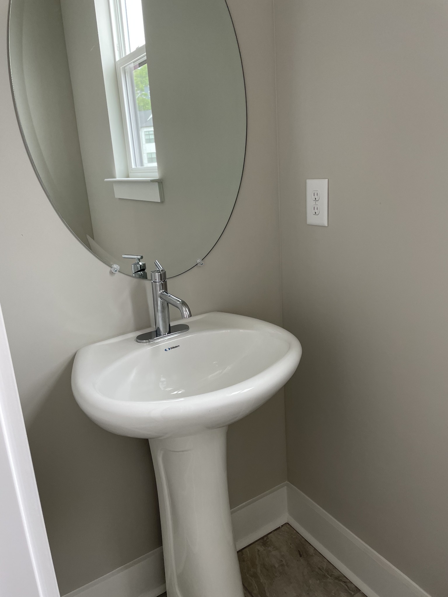 217 Stonecrest Drive, Unit 217 Nashville, TN 37209 - Photo 8 of 20 a bathroom with a sink a mirror and a window