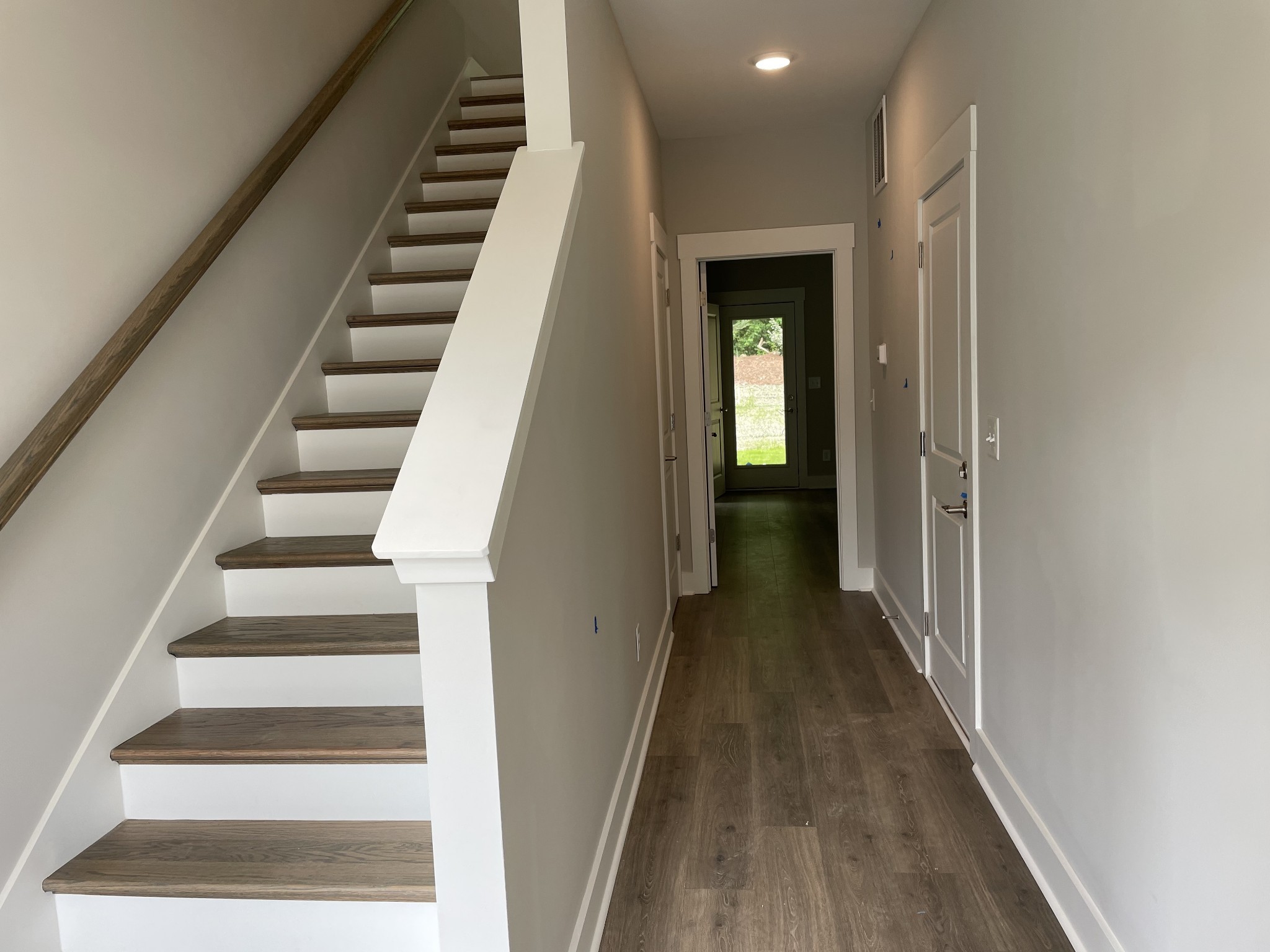 217 Stonecrest Drive, Unit 217 Nashville, TN 37209 - Photo 9 of 20 a view of entryway and hall with wooden floor