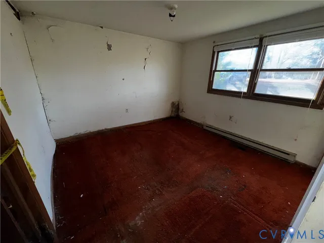 en empty room with windows