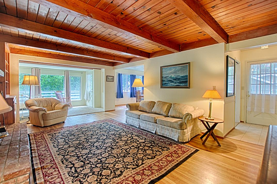 7 Plaza Mount Hermon, CA 95041 - Photo 11 of 26 a living room with furniture and a rug