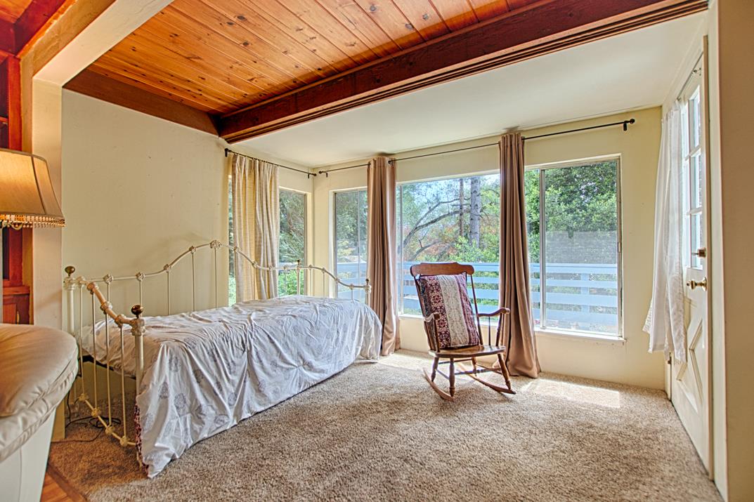 7 Plaza Mount Hermon, CA 95041 - Photo 12 of 26 a view of a livingroom with furniture and floor to ceiling window