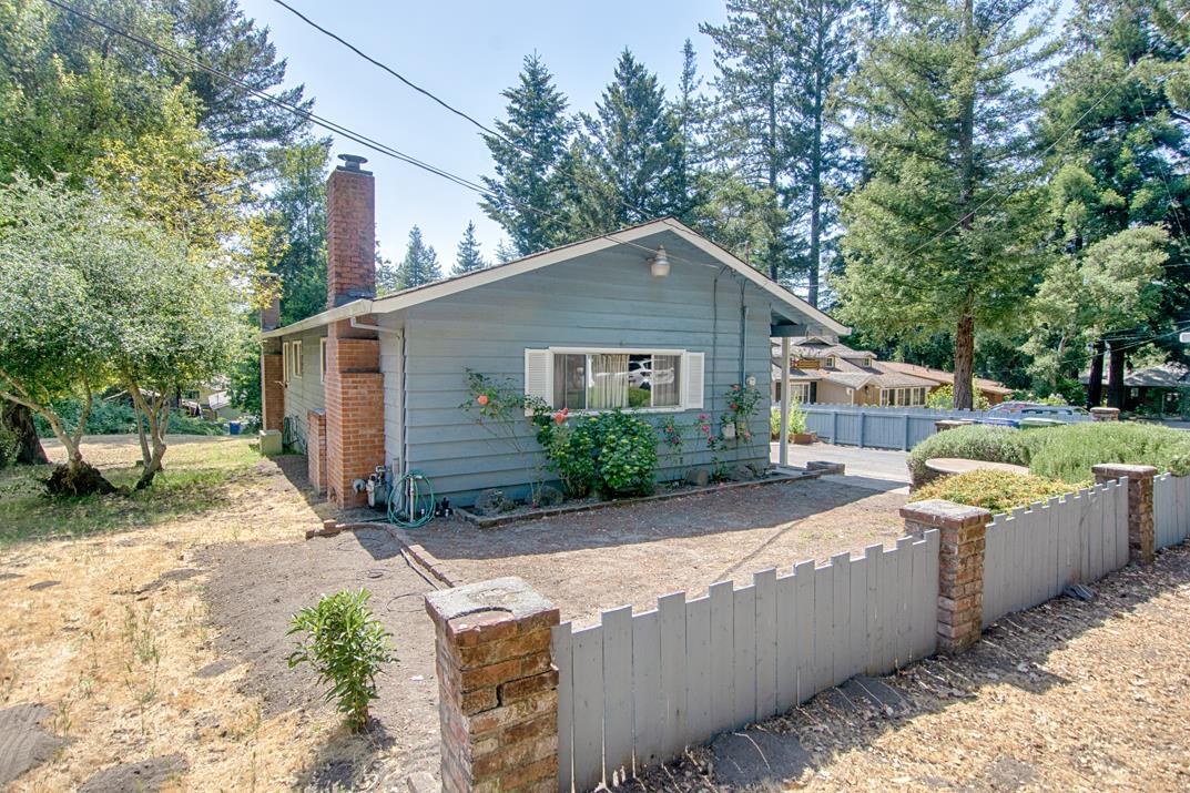 7 Plaza Mount Hermon, CA 95041 - Photo 2 of 26 a front view of a house with a yard