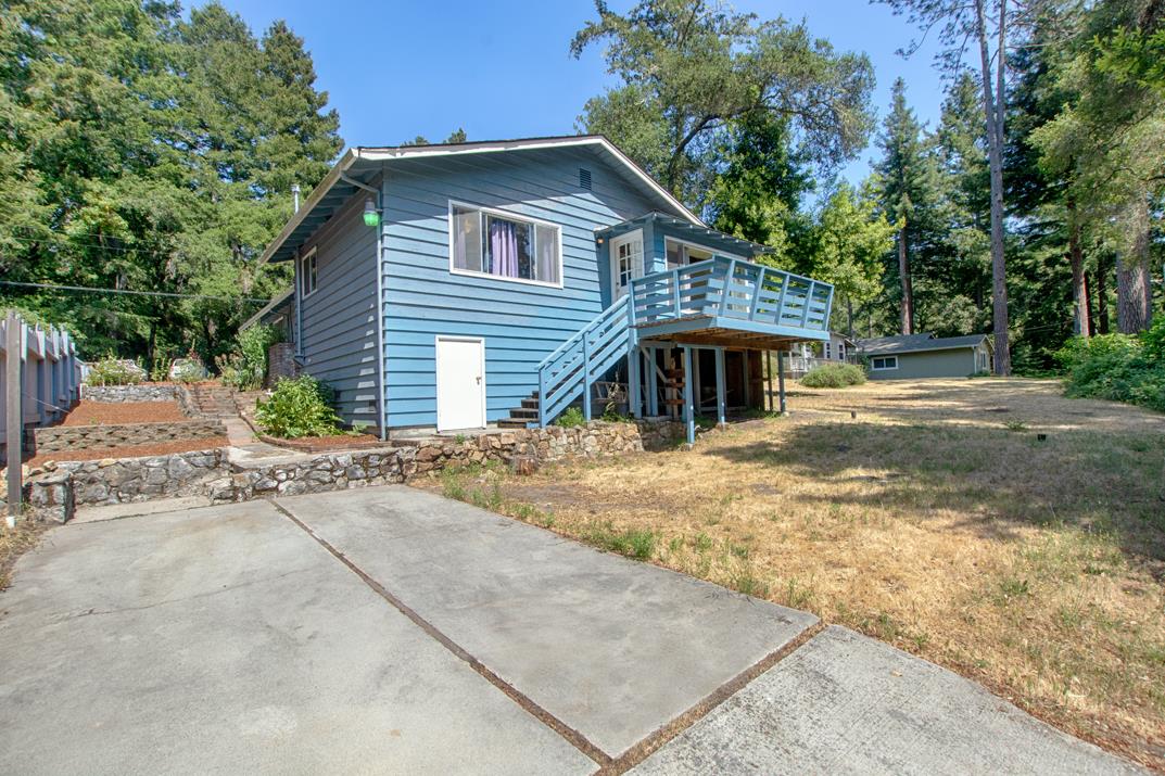 7 Plaza Mount Hermon, CA 95041 - Photo 3 of 26 front view of a house with a street