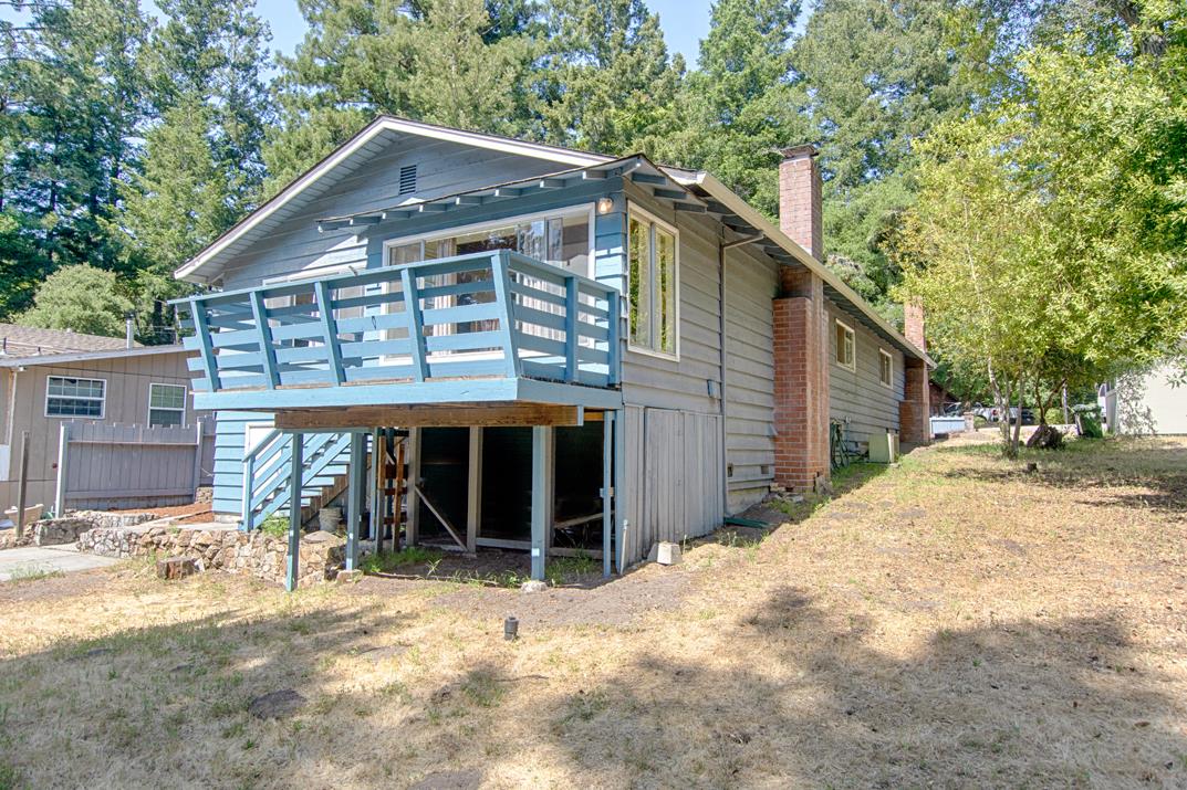 7 Plaza Mount Hermon, CA 95041 - Photo 7 of 26 a front view of a house with a yard