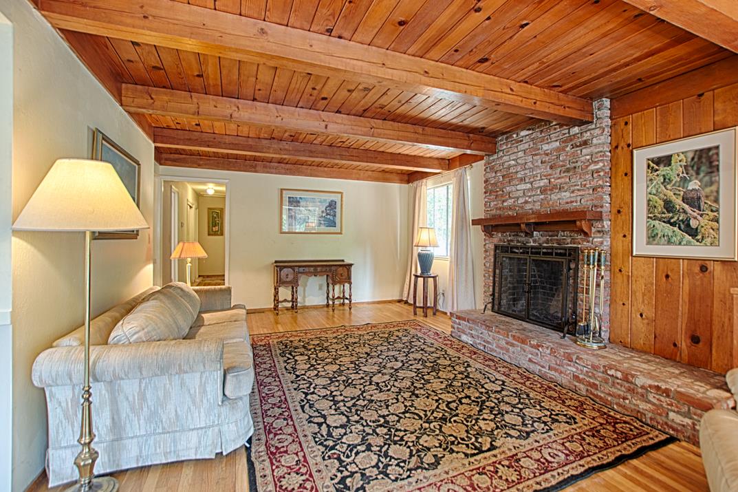 7 Plaza Mount Hermon, CA 95041 - Photo 10 of 26 a bedroom with a bed and a fireplace