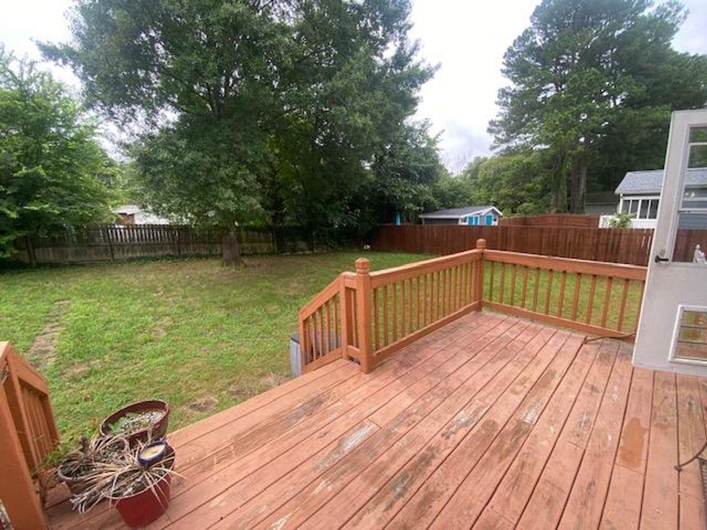 1917 Carthage Circle Raleigh, NC 27604 - Photo 12 of 15 a view of deck with seating and trees