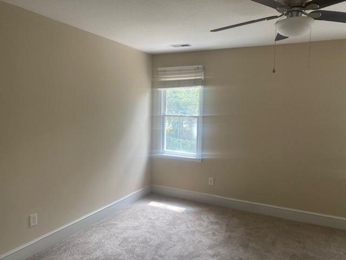 1917 Carthage Circle Raleigh, NC 27604 - Photo 15 of 15 an empty room with a window