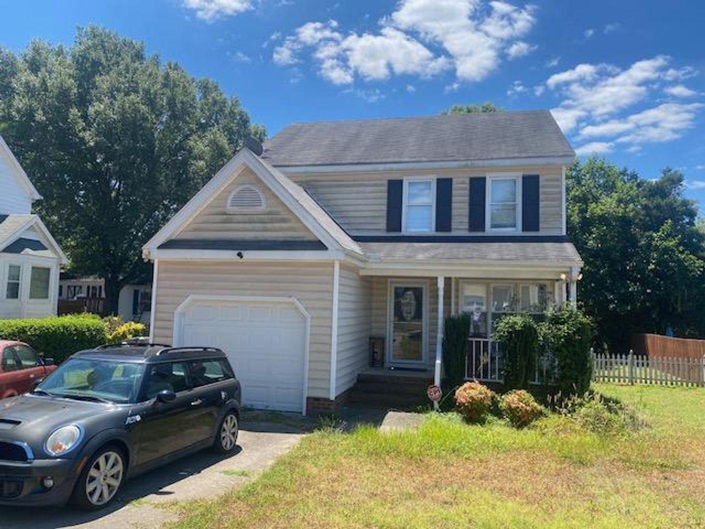 1917 Carthage Circle Raleigh, NC 27604 - Photo 2 of 15 a view of a car in front of house