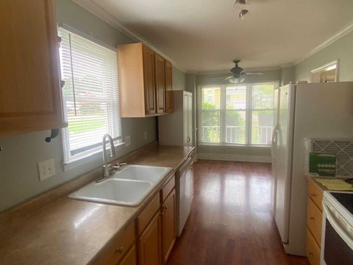 1917 Carthage Circle Raleigh, NC 27604 - Photo 6 of 15 a bathroom with a sink and a window