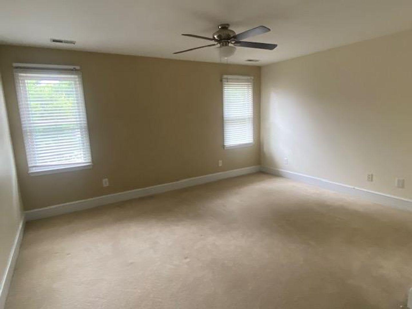 1917 Carthage Circle Raleigh, NC 27604 - Photo 9 of 15 a view of an empty room with a window