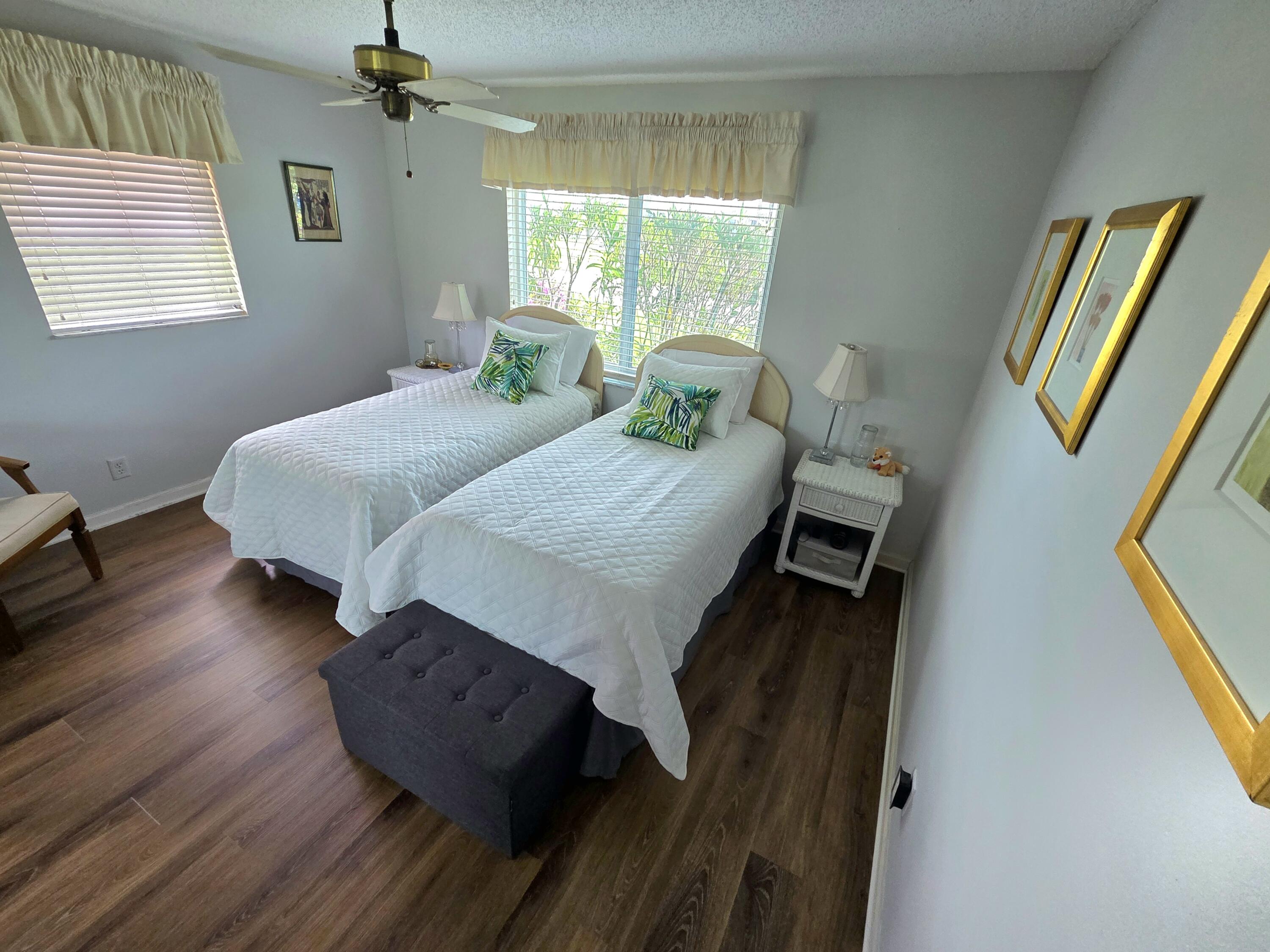 5213 Michael Drive West Palm Beach, FL 33417 - Photo 23 of 47 a bed room with a bed and a window