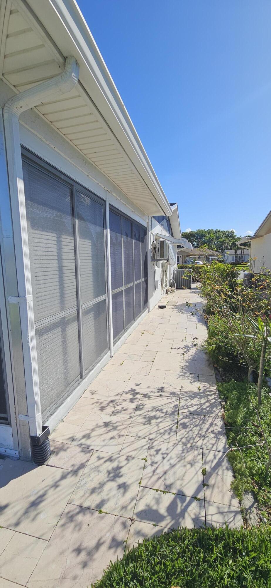 5213 Michael Drive West Palm Beach, FL 33417 - Photo 27 of 47 a view of a backyard of the house