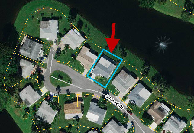 5213 Michael Drive West Palm Beach, FL 33417 - Photo 3 of 47 an aerial view of a house