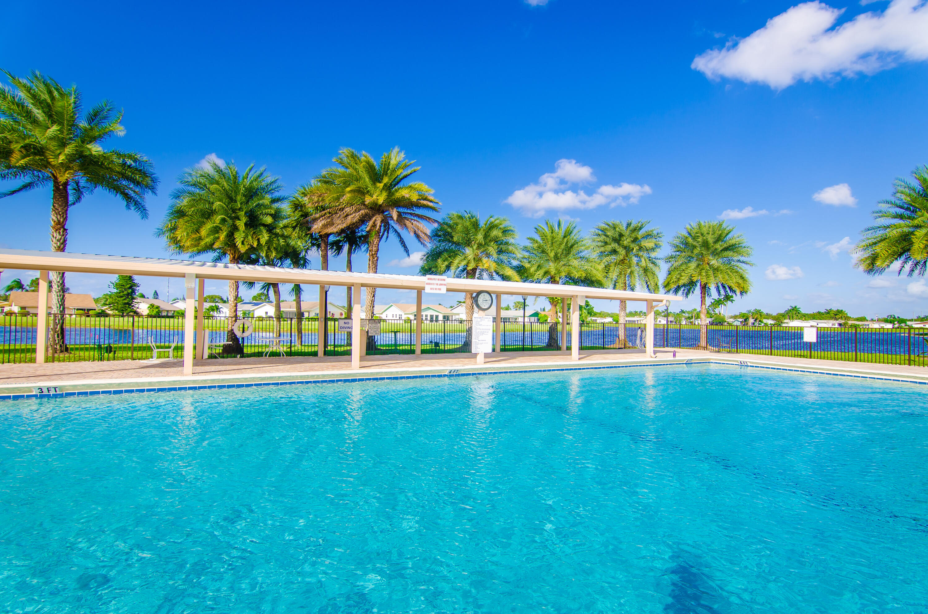 5213 Michael Drive West Palm Beach, FL 33417 - Photo 35 of 47 a view of a house with a swimming pool