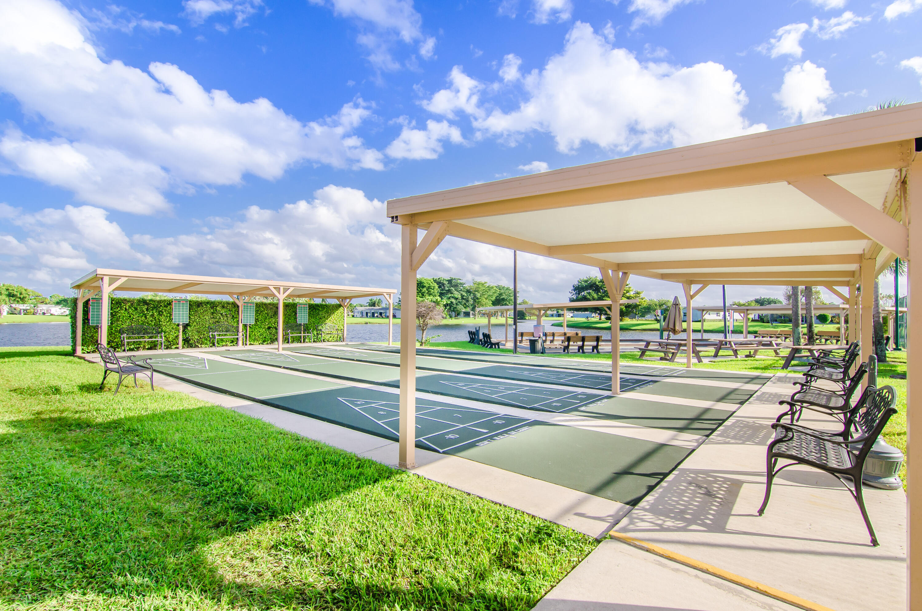 5213 Michael Drive West Palm Beach, FL 33417 - Photo 39 of 47 a view of swimming pool with a patio