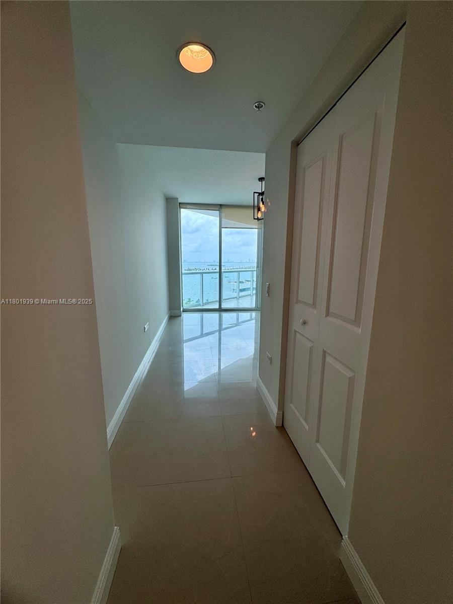 Edgewater Miami, FL 33137 - Photo 13 of 31 an empty room with windows