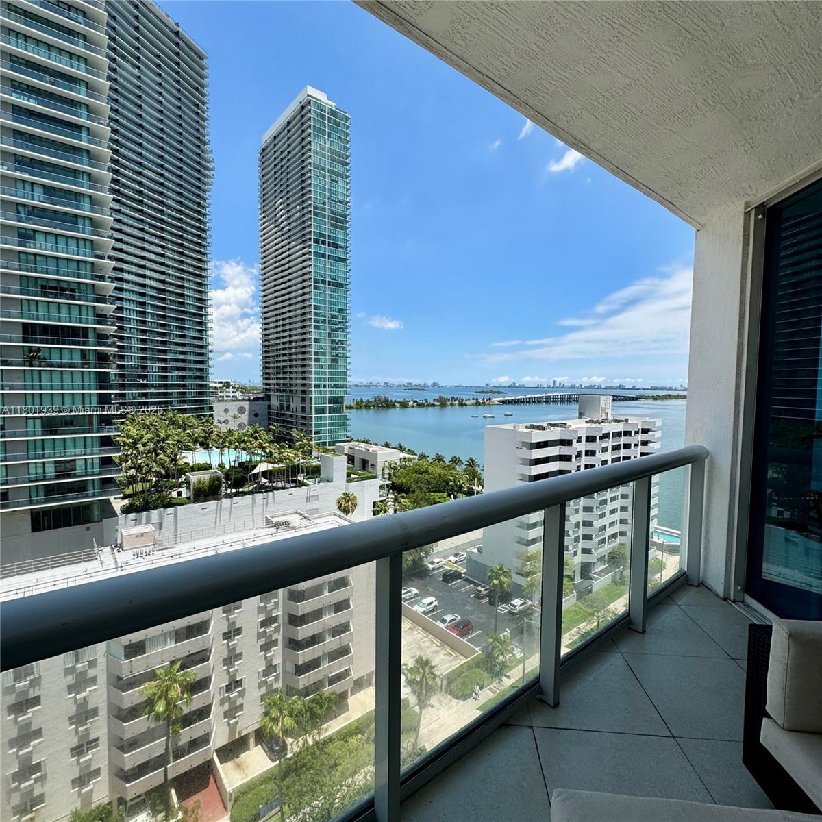 Edgewater Miami, FL 33137 - Photo 18 of 31 a city view from a balcony with outdoor seating