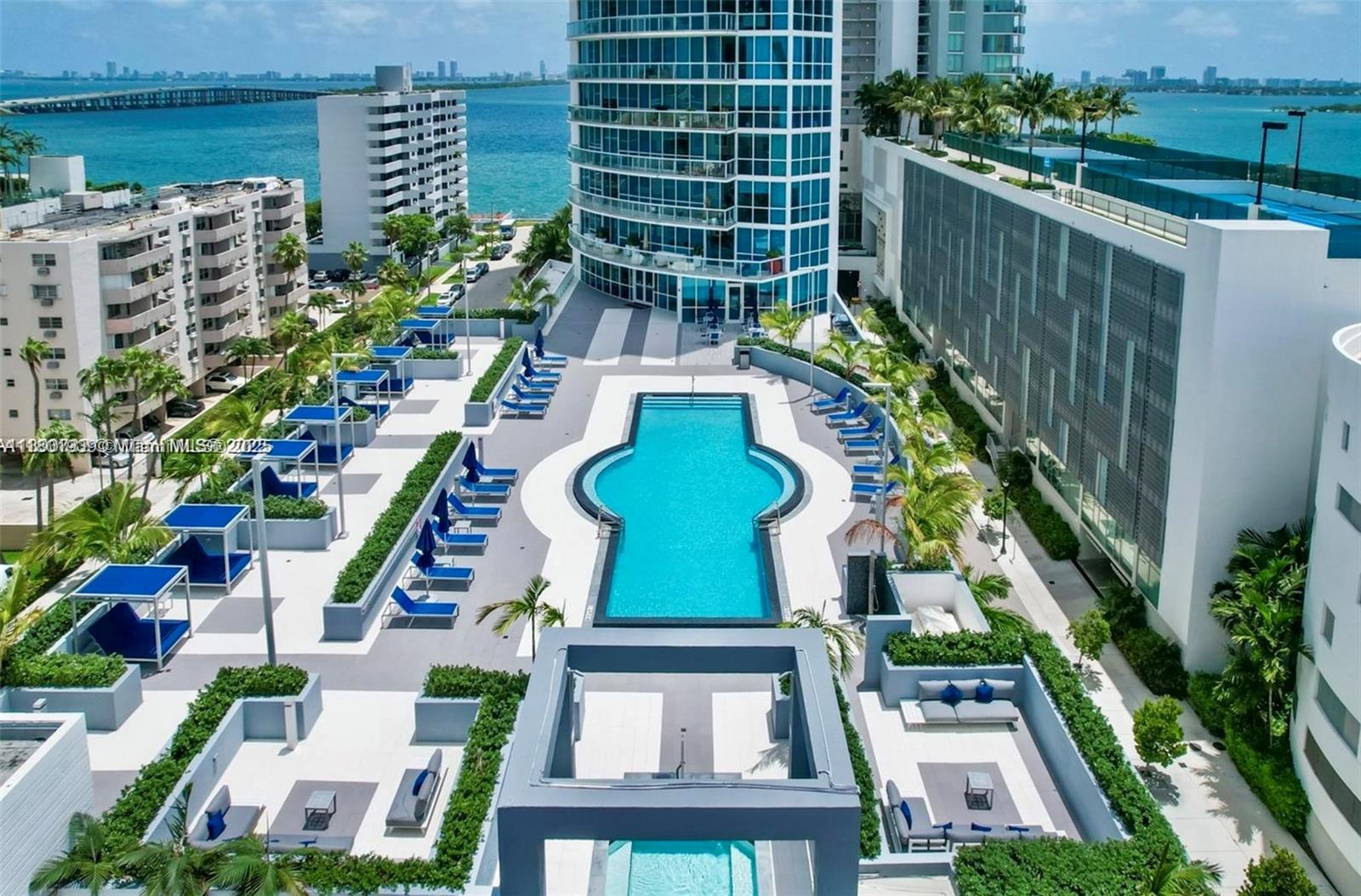 Edgewater Miami, FL 33137 - Photo 20 of 31 a view of swimming pool with outdoor seating and plants