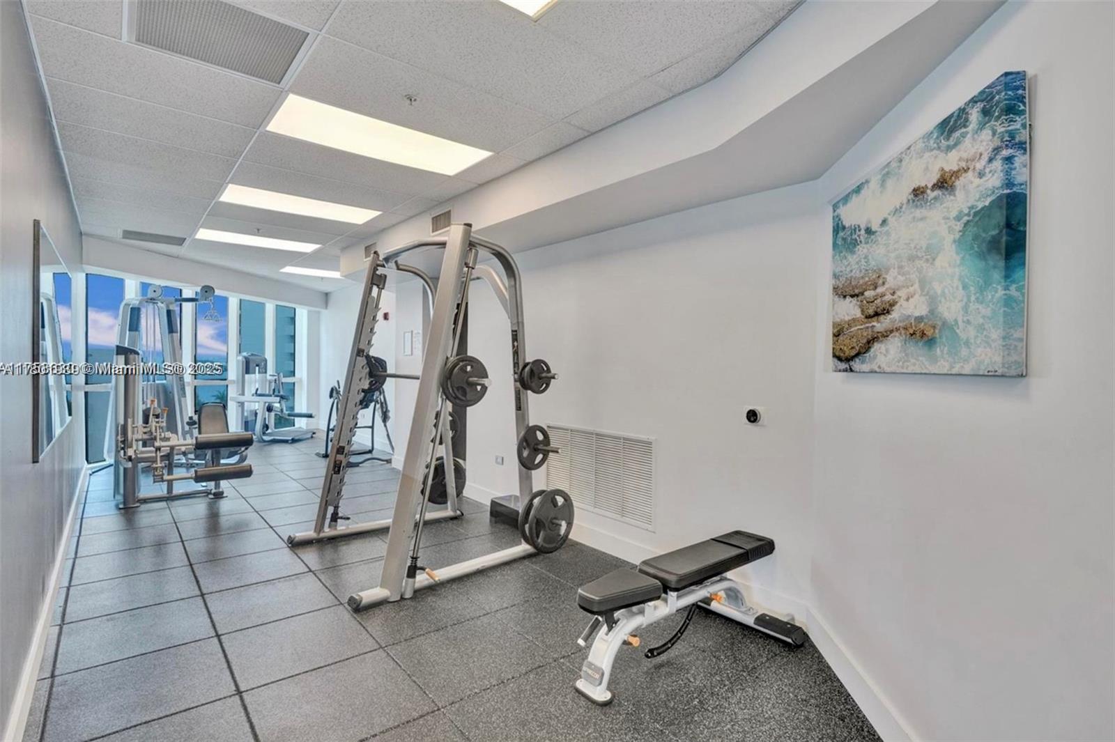 Edgewater Miami, FL 33137 - Photo 25 of 31 a view of a room with gym equipment