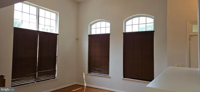 a view of fireplace and window