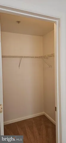 a bathroom with a double vanity sink and mirror