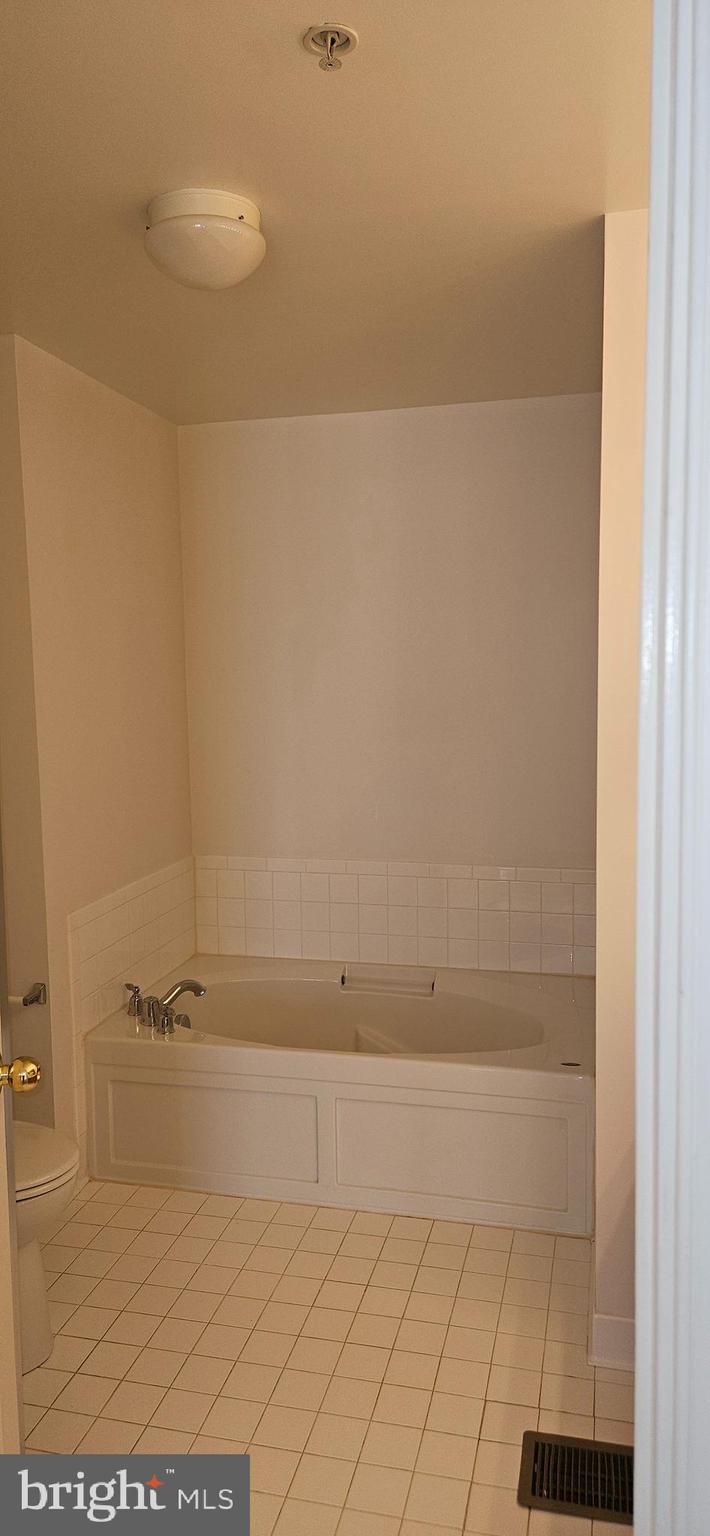 12332 Rollys Ridge Avenue, Unit 2105 Upper Marlboro, MD 20774 - Photo 23 of 31 a view of bathroom