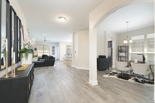 a view of a living room and dining room