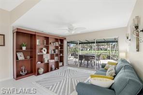 3687 El Segundo Court Naples, FL 34109 - Photo 7 of 17 a living room with furniture and a table