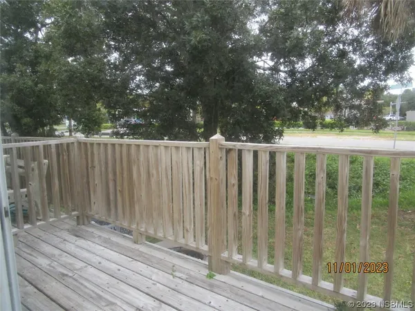 a view of a wooden fence