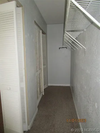 a view of hallway with stairs